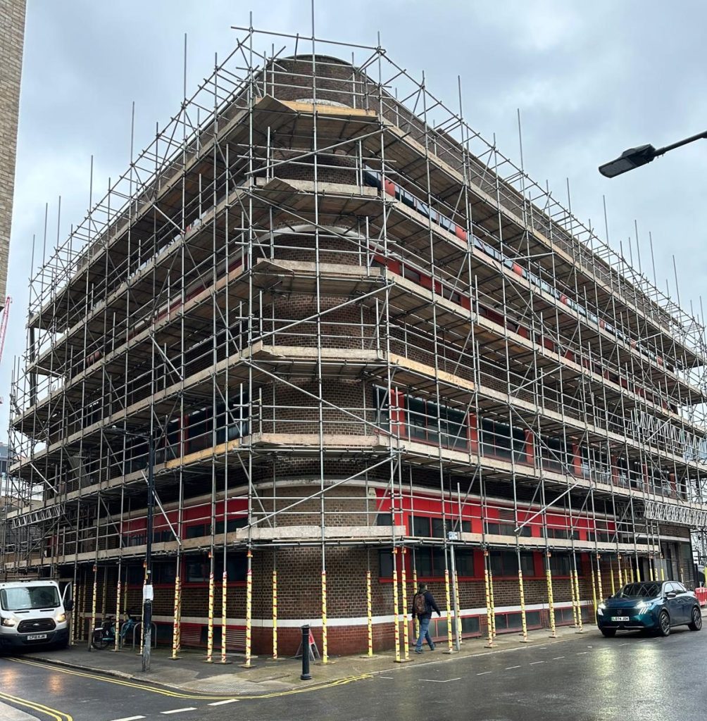 Scaffolding hire installed on a multi-storey commercial building for external works